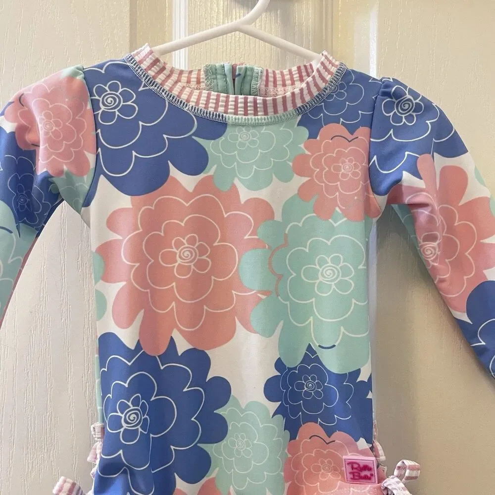 RuffleButts Pastel Petals Long Sleeve One-Piece Rashguard Swimsuit Girls 6-12 M